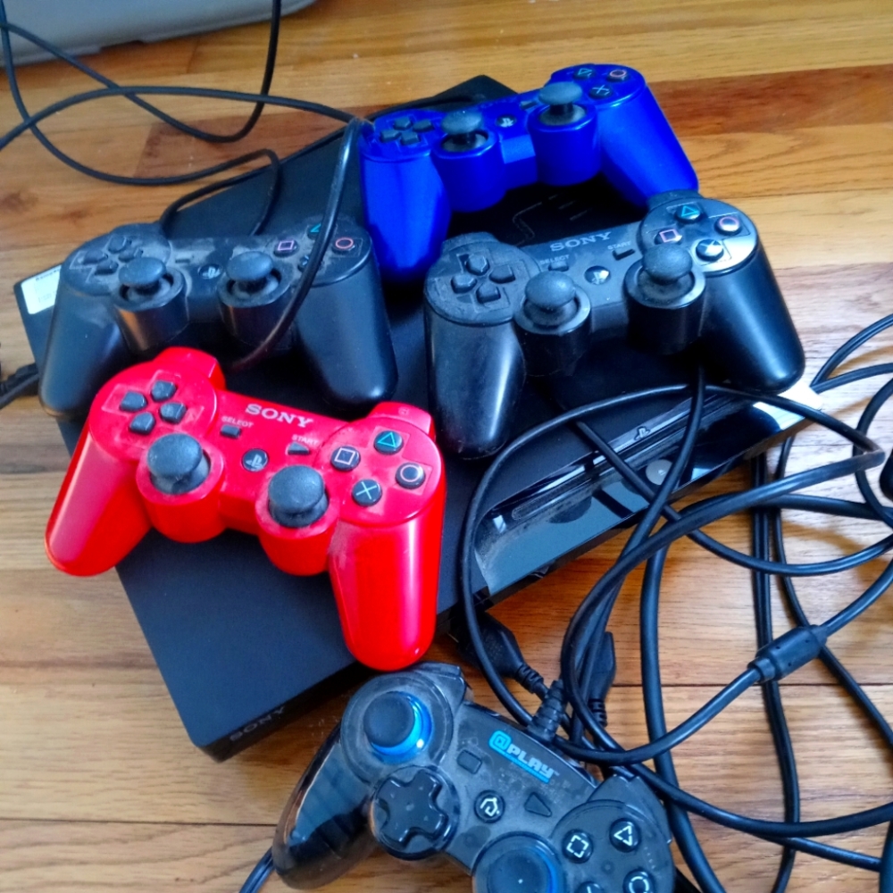PS3 Slim with 5 controllers